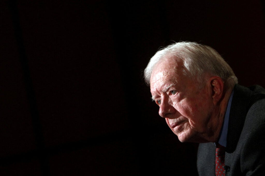 FILE PHOTO: Former U.S. President Jimmy Carter attends an interview with Reuters in Cairo, Egypt, January 12, 2012. REUTERS/Amr Abdallah Dalsh/File Photo